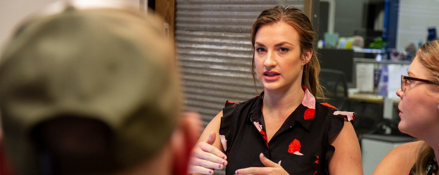 marketers discussing vendors around a table